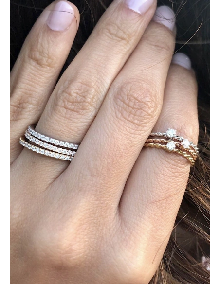 TWISTY 18K rose gold brilliant cut diamond solitaire ring.