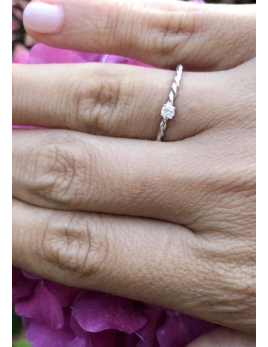 TWISTY 18K white gold brilliant cut diamond solitaire ring.