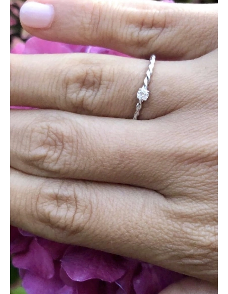 TWISTY 18K white gold brilliant cut diamond solitaire ring.