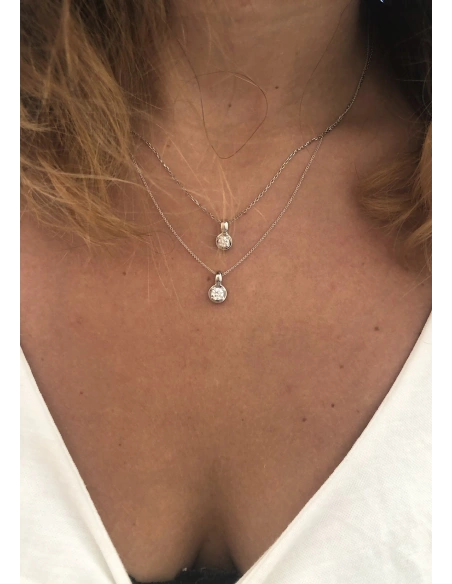 ZAHARA 18K white gold brilliant cut diamond pendant.