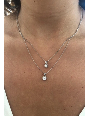 ZAHARA 18K white gold brilliant cut diamond pendant.