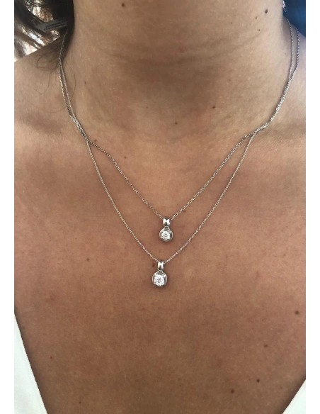 ZAHARA 18K white gold brilliant cut diamond pendant.