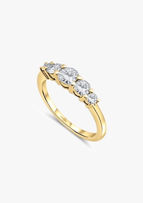 Anillo media alianza MJ en oro 18K con 5 diamantes talla brillante en degradé