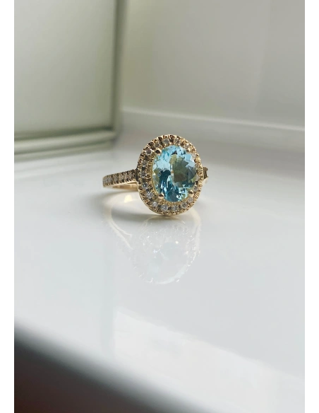 Bague ELSA en or jaune 18K avec diamants et d'aigue-marine.