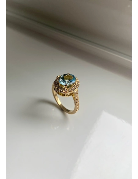 ELSA 18K yellow gold with diamonds and oval cut aquamarine halo ring