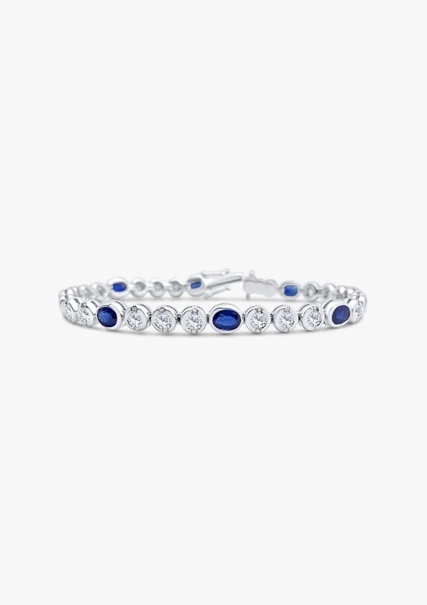 Pulsera riviêre BLUE LUMIÈRE en oro blanco 18K con diamantes y zafiros azules