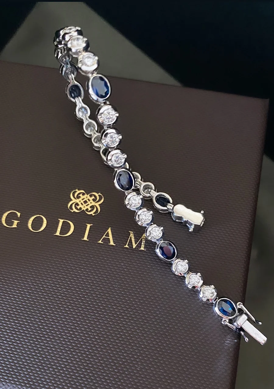 BLUE LUMIÈRE 18K white gold diamond and sapphire bracelet.
