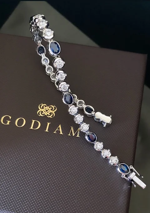 Pulseira BLUE LUMIÈRE ouro branco 18K diamantes e safiras.