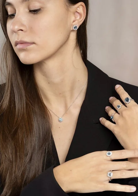 ELSA 18K white gold diamonds and oval cut London Blue topaz halo ring