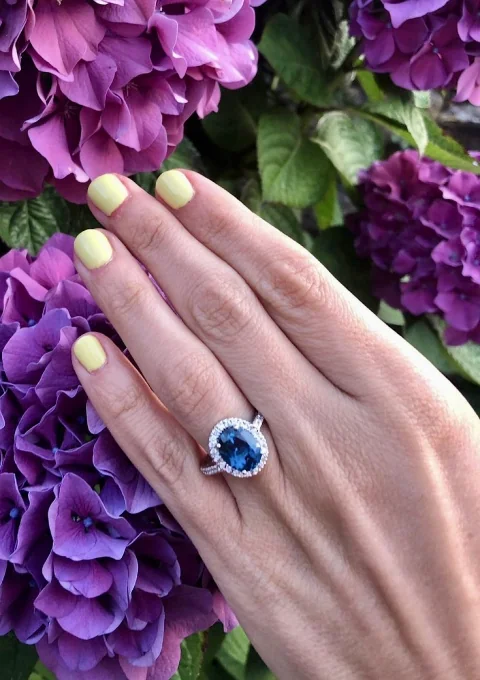 ELSA 18K white gold diamonds and oval cut London Blue topaz halo ring